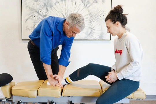 Chiropractor Isle Of Palms SC Jesse Ross And Patient